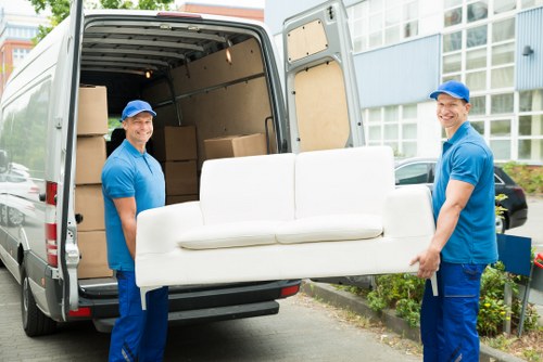 Student moving boxes and furniture being loaded for a Croydon relocation