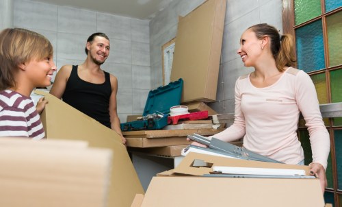 Removal van safety team preparing for a careful loading task