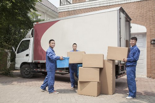 Movers handling flat removals in a Croydon apartment block
