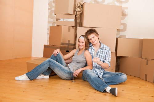 Careful handling of packed student belongings during a move
