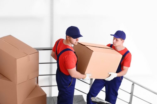 Removal company planning a home move in Croydon with boxes and furniture