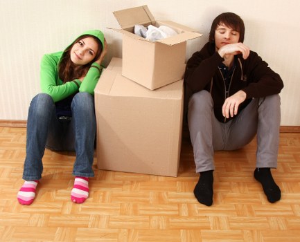 Local moving team organising household items in Croydon