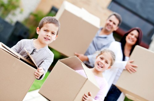 Furniture and boxes being transported from a Croydon apartment