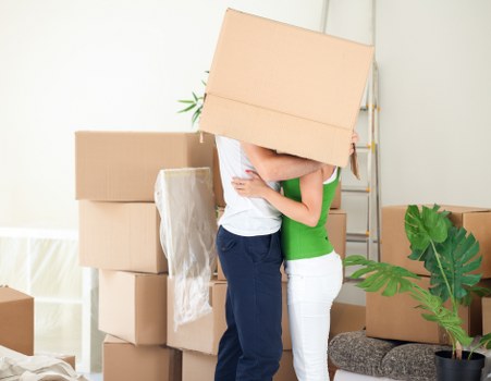 Packed office furniture and equipment ready for relocation