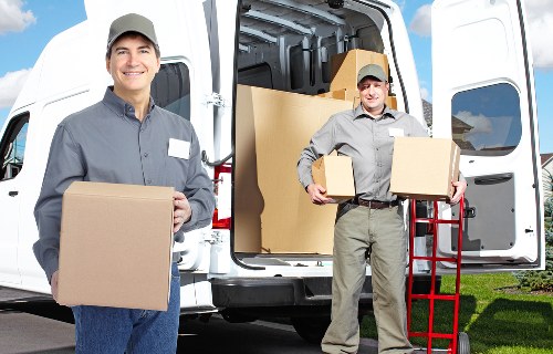 Packed boxes and furniture ready for quick local removals in Croydon