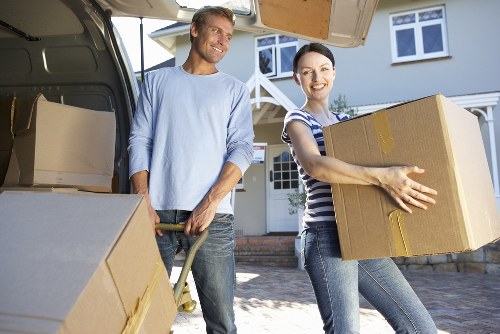Trained movers handling boxes safely during a Croydon removal